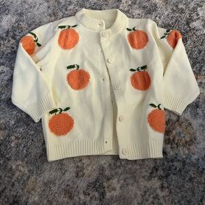 Kids Cream Cardigan with Orange Fruit Design